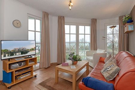 Apartmenthaus Atlantik Apartmenthaus Atlantik 213 Kühlungsborn - Wohn-Essbereich mit Couch