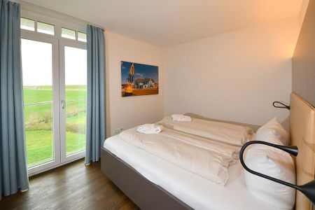 Resort Deichgraf Resort Deichgraf 31-11 Wremen - Schlafzimmer mit Doppelbett