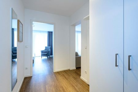 Deichhäuser Anna Küste Deichhäuser Anna Küste 1-21 Bensersiel - Flur mit Kleiderschrank