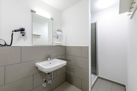 Deichhäuser Anna Küste Deichhäuser Anna Küste 1-21 Bensersiel - Badezimmer mit Waschtisch und Dusche