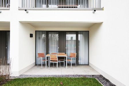 Deichhäuser Anna Küste Deichhäuser Anna Küste 2-11 Bensersiel - Terrasse mit Sitzgelegenheiten