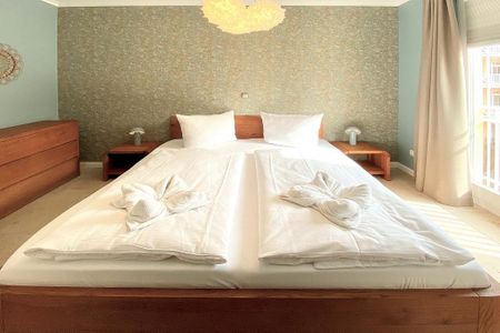 Dünenschloss Dünenschloss 2-16 Kühlungsborn - Schlafzimmer mit Doppelbett