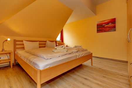 Dünenschloss Dünenschloss 2-25 Kühlungsborn - Schlafzimmer mit Doppelbett