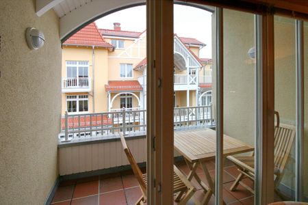 Dünenschloss Dünenschloss 2-25 Kühlungsborn - Überdachter Balkon mit Sitzgelegenheit