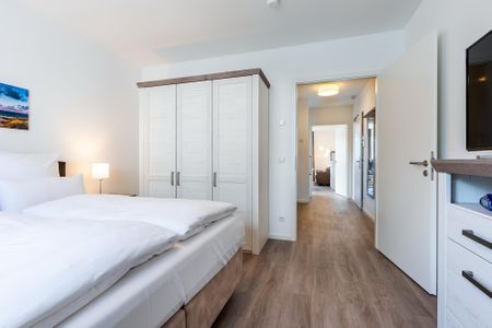 Aparthotel Ostseeallee Aparthotel Ostseeallee 2-12 Boltenhagen - Schlafzimmer mit Zugang zum Wohnbereich