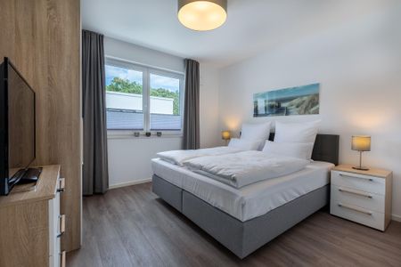 Aparthotel Ostseeallee Aparthotel Ostseeallee 2-16 Boltenhagen - Schlafzimmer mit Boxspringbett (1,80 x 2,00 m)