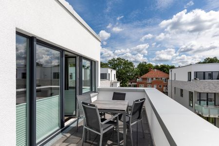 Aparthotel Ostseeallee Aparthotel Ostseeallee 2-16 Boltenhagen - Dachterrasse mit Tisch und Sitzgelegenheiten