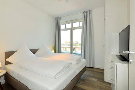 Aparthotel Anna Düne Aparthotel Anna Düne 1-18 Wangerooge - Schlafzimmer mit Doppelbett