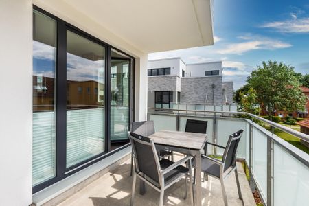 Aparthotel Ostseeallee Aparthotel Ostseeallee 3-23 Boltenhagen - Balkon mit Tisch und Sitzgelegenheiten