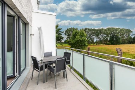 Aparthotel Ostseeallee Aparthotel Ostseeallee 3-26 Boltenhagen - Balkon mit Tisch und Sitzgelegenheiten