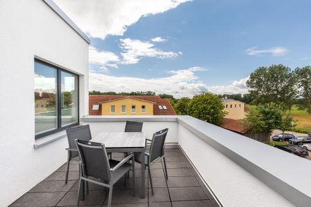 Aparthotel Ostseeallee Aparthotel Ostseeallee 4-38 Boltenhagen - Dachterrasse mit Tisch und Sitzgelegenheiten