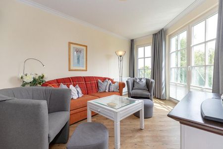 Apartmenthaus Atlantik Apartmenthaus Atlantik 214 Kühlungsborn - Wohn-Essbereich mit Couch