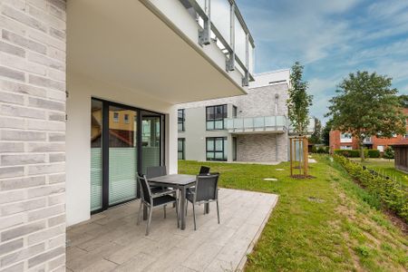 Aparthotel Ostseeallee Aparthotel Ostseeallee 3-19 Boltenhagen - Terrasse mit Tisch und Sitzmöglichkeiten