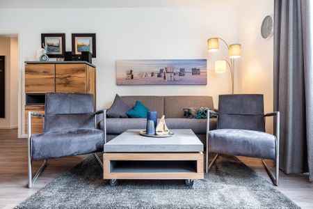 Aparthotel Ostseeallee Aparthotel Ostseeallee 3-20 Boltenhagen - Wohn-/Essbereich mit Doppelschlafcouch