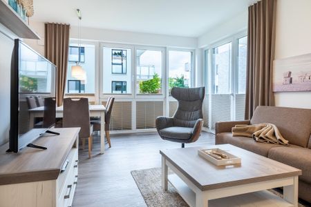 Aparthotel Ostseeallee Aparthotel Ostseeallee 5-41 Boltenhagen - Wohn-/Essbereich mit Zugang zur Terrasse