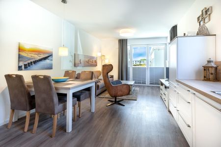Aparthotel Ostseeallee Aparthotel Ostseeallee 5-42 Boltenhagen - Wohn-/Essbereich mit Zugang zur Terrasse