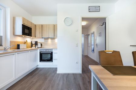 Aparthotel Ostseeallee Aparthotel Ostseeallee 5-42 Boltenhagen - Wohn-/Essbereich mit Küchenzeile