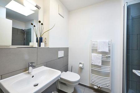 Deichhäuser Anna Küste Deichhäuser Anna Küste 4-32 Bensersiel - Badezimmer mit WC und Waschtisch