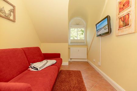 Dünenschloss Dünenschloss 2-24 Kühlungsborn - Wohn-Essbereich mit Couch