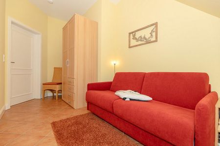 Dünenschloss Dünenschloss 2-24 Kühlungsborn - Wohn-Essbereich mit Couch