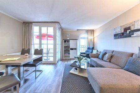 Apartmenthaus Atlantik Apartmenthaus Atlantik 117 Kühlungsborn - Wohn-Essbereich mit Couch