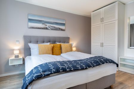 Godewindpark Travemünde Godewindpark Travemünde 2-18 Travemünde - Schlafzimmer "1" mit Boxspringdoppelbett und Kleiderschrank