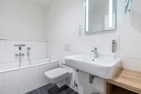 Godewindpark Travemünde Godewindpark Travemünde 2-18 Travemünde - Badezimmer "2" mit Badewanne und Waschtisch
