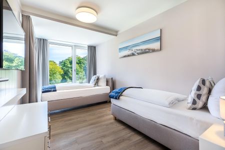Godewindpark Travemünde Godewindpark Travemünde 1-02 Travemünde - Schlafzimmer "2" mit TV und zwei Boxspringeinzelbetten