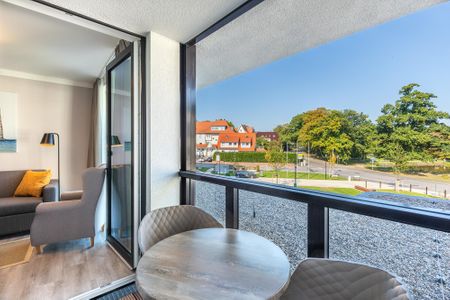 Godewindpark Travemünde Godewindpark Travemünde 1-14 Travemünde - Überdachte Loggia mit Blick zum Godewindpark