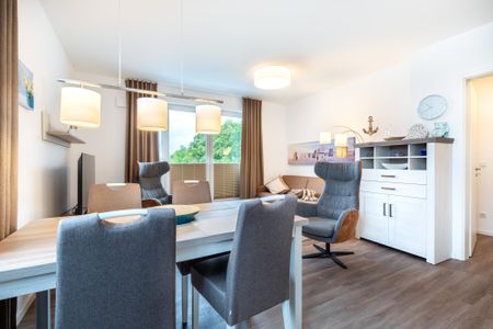 Aparthotel Ostseeallee Aparthotel Ostseeallee 1-07 Boltenhagen - Wohn-/ Essbereich mit Sitzgelegenheit