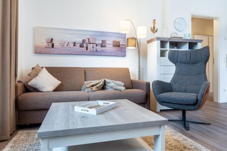 Aparthotel Ostseeallee Aparthotel Ostseeallee 1-07 Boltenhagen - Wohn-/Essbereich mit Doppelschlafcouch