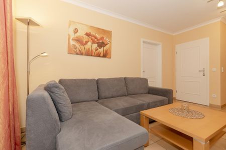 Apartment-Residenz Ostseestrand Apartment-Residenz Ostseestrand 27 Kühlungsborn - Wohn-Essbereich mit Couch