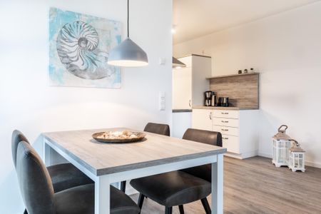Apartmentanlage Meerblickvilla Apartmentanlage Meerblickvilla 0-01 Großenbrode - Wohn-/Essbereich mit Esstisch und Bestuhlung - gbmv0-01 - Großenbrode
