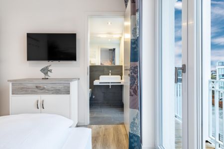 Apartmentanlage Meerblickvilla Apartmentanlage Meerblickvilla 2-18 Großenbrode - Schlafzimmer mit Zugang zum Badezimmer