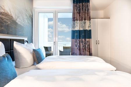 Apartmentanlage Meerblickvilla Apartmentanlage Meerblickvilla 2-23 Großenbrode - Schlafzimmer 1 mit Zugang zum Balkon