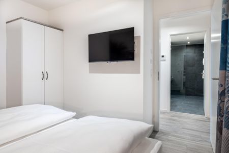Apartmentanlage Meerblickvilla Apartmentanlage Meerblickvilla 2-23 Großenbrode - Schlafzimmer 2 mit Flatscreen-TV