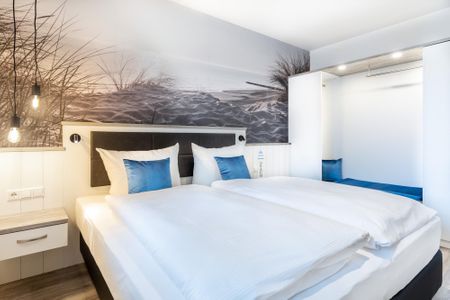 Apartmentanlage Meerblickvilla Apartmentanlage Meerblickvilla 2-25 Großenbrode - Schlafzimmer 1 mit Boxspringbett