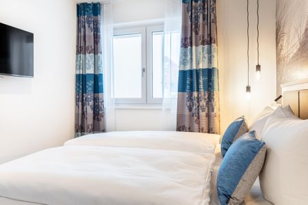 Apartmentanlage Meerblickvilla Apartmentanlage Meerblickvilla 2-25 Großenbrode - Schlafzimmer 1 mit Flatscreen-TV
