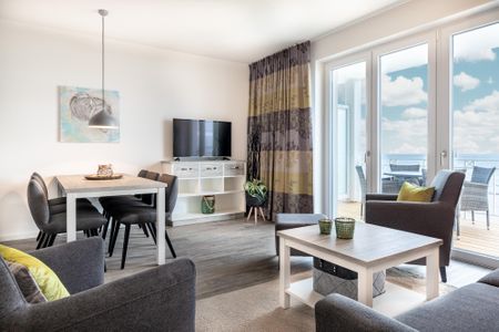 Apartmentanlage Meerblickvilla Apartmentanlage Meerblickvilla 2-26 Großenbrode - Wohn-/Essbereich mit Zugang zum Balkon