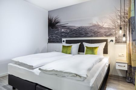 Apartmentanlage Meerblickvilla Apartmentanlage Meerblickvilla 2-26 Großenbrode - Schlafzimmer mit Boxspringbett