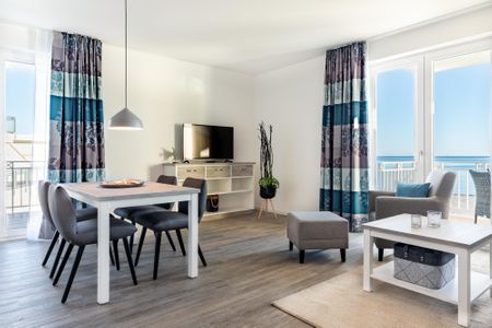 Apartmentanlage Meerblickvilla Apartmentanlage Meerblickvilla 2-27 Großenbrode - Wohn-/Essbereich mit Zugang zum Balkon