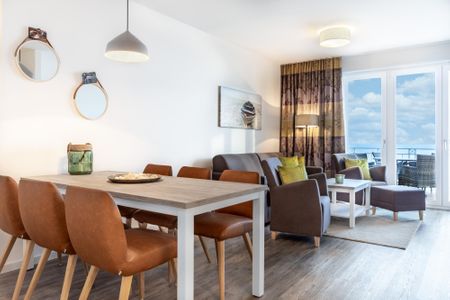 Apartmentanlage Meerblickvilla Apartmentanlage Meerblickvilla 3-38 Großenbrode - Wohn-/Essbereich mit Zugang zum Balkon
