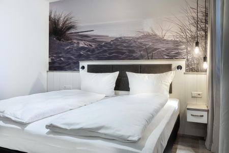 Apartmentanlage Meerblickvilla Apartmentanlage Meerblickvilla 3-40 Großenbrode - Schlafzimmer mit Boxspringbett
