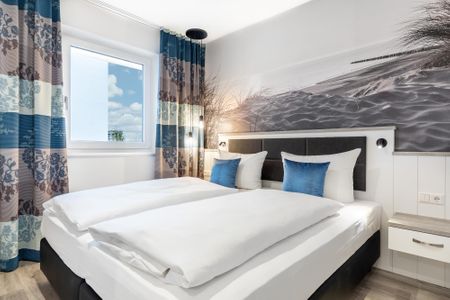 Apartmentanlage Meerblickvilla Apartmentanlage Meerblickvilla 1-16 Großenbrode - Schlafzimmer mit Boxspringbett
