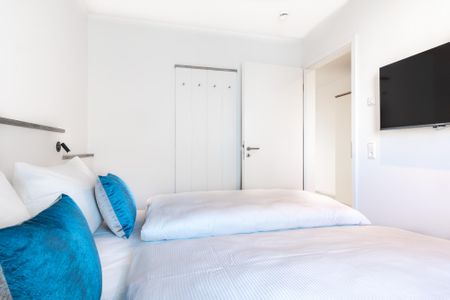Apartmentanlage Meerblickvilla Apartmentanlage Meerblickvilla 2-30 Großenbrode - Schlafzimmer mit Flatscreen-TV