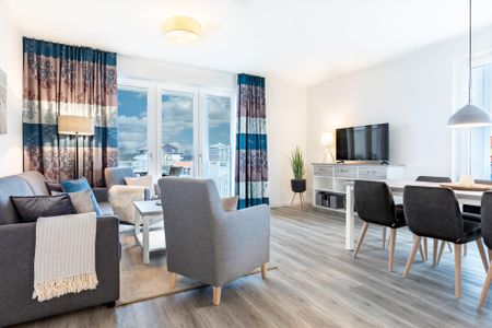 Apartmentanlage Meerblickvilla Apartmentanlage Meerblickvilla 3-32 Großenbrode - Wohn-/Essbereich mit Zugang zum Balkon