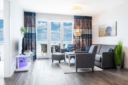Apartmentanlage Meerblickvilla Apartmentanlage Meerblickvilla 2-25 Großenbrode - Wohn-/Essbereich mit Zugang zum Balkon