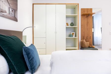Ferienapartments am Krusespeicher Ferienapartments am Krusespeicher 0-02 Wismar - Wohn-/Schlafbereich mit Kleiderschrank
