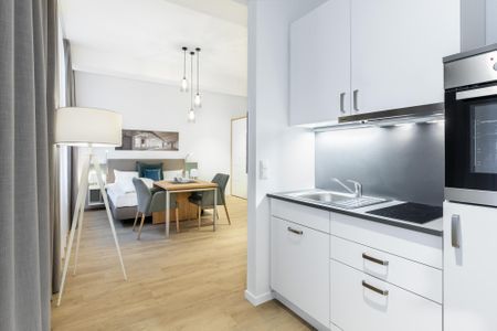 Ferienapartments am Krusespeicher Ferienapartments am Krusespeicher 0-02 Wismar - Wohn-/Schlafbereich mit Küchenzeile