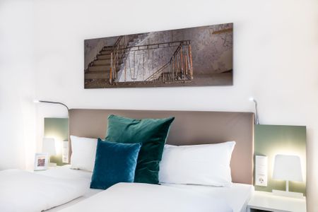 Ferienapartments am Krusespeicher Ferienapartments am Krusespeicher 0-04 Wismar - Wohn-/Schlafbereich mit Boxspringbett